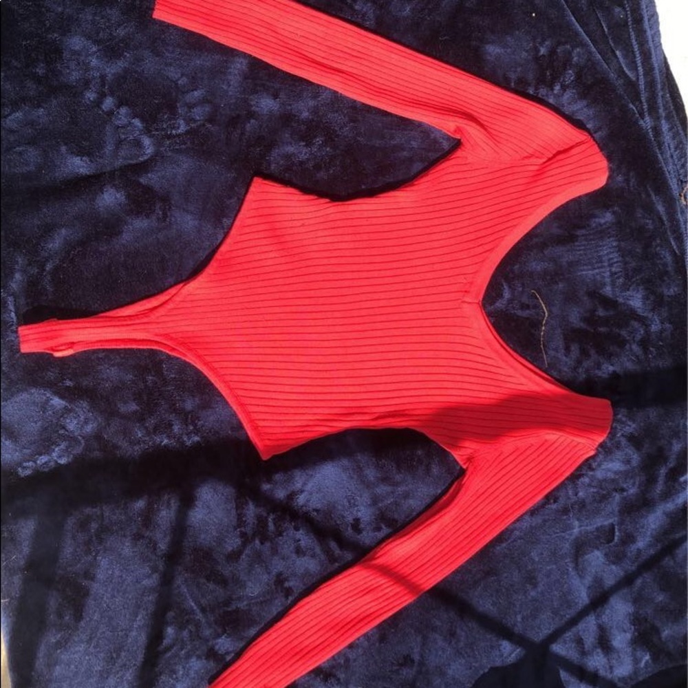Red long sleeve body suit